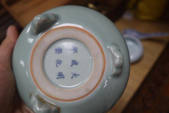 Two Chinese porcelain censers, a yellow glazed cat and a blue and white spoon warmer